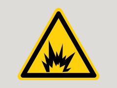 Señal de advertencia triangular amarilla y negra con un rayo y líneas dentadas, que indica peligro eléctrico.