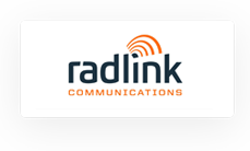 Radlink Communications logo with "radlink" in dark blue text and "COMMUNICATIONS" in orange below, featuring an orange signal icon above the "i.