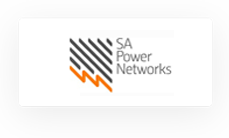 SA Power Networks logo with black diagonal lines and an orange zigzag, alongside the company name in grey text on a white background.