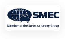 SMEC logo featuring a globe with Australia highlighted; text reads “SMEC Member of the Surbana Jurong Group” on a white background.